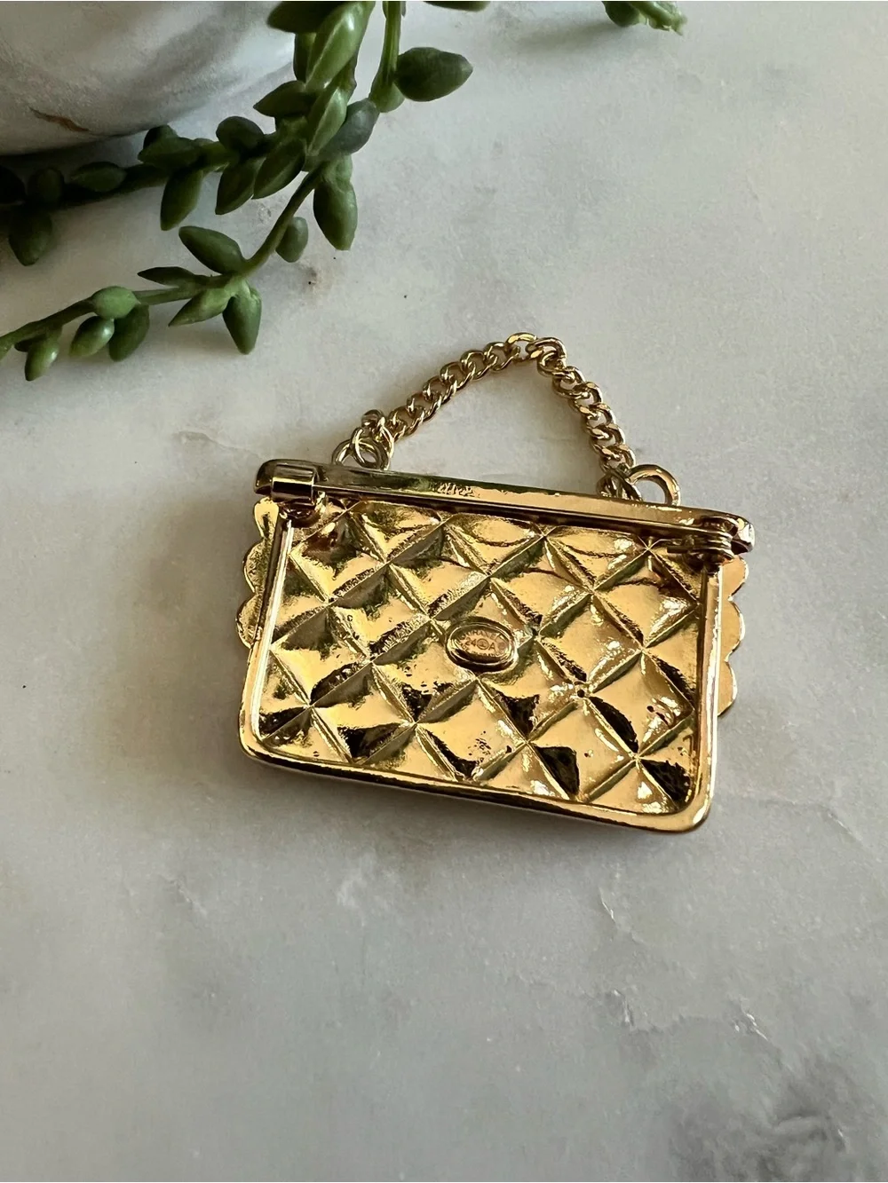 CHANEL White and Black Enamel Bag Charm Pin with Gold Tone